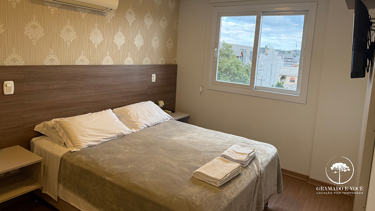 Modern 2-Bed Apt with BBQ in Gramado
