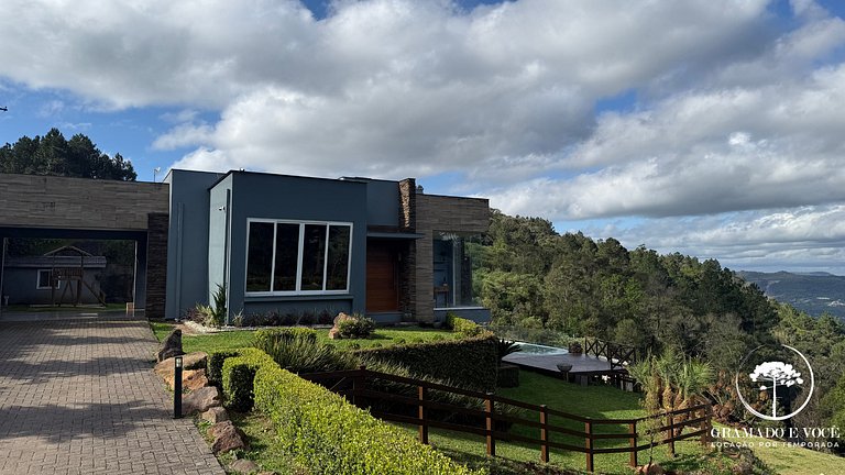 Casa con piscina 3 suites a 15min centro Gramado